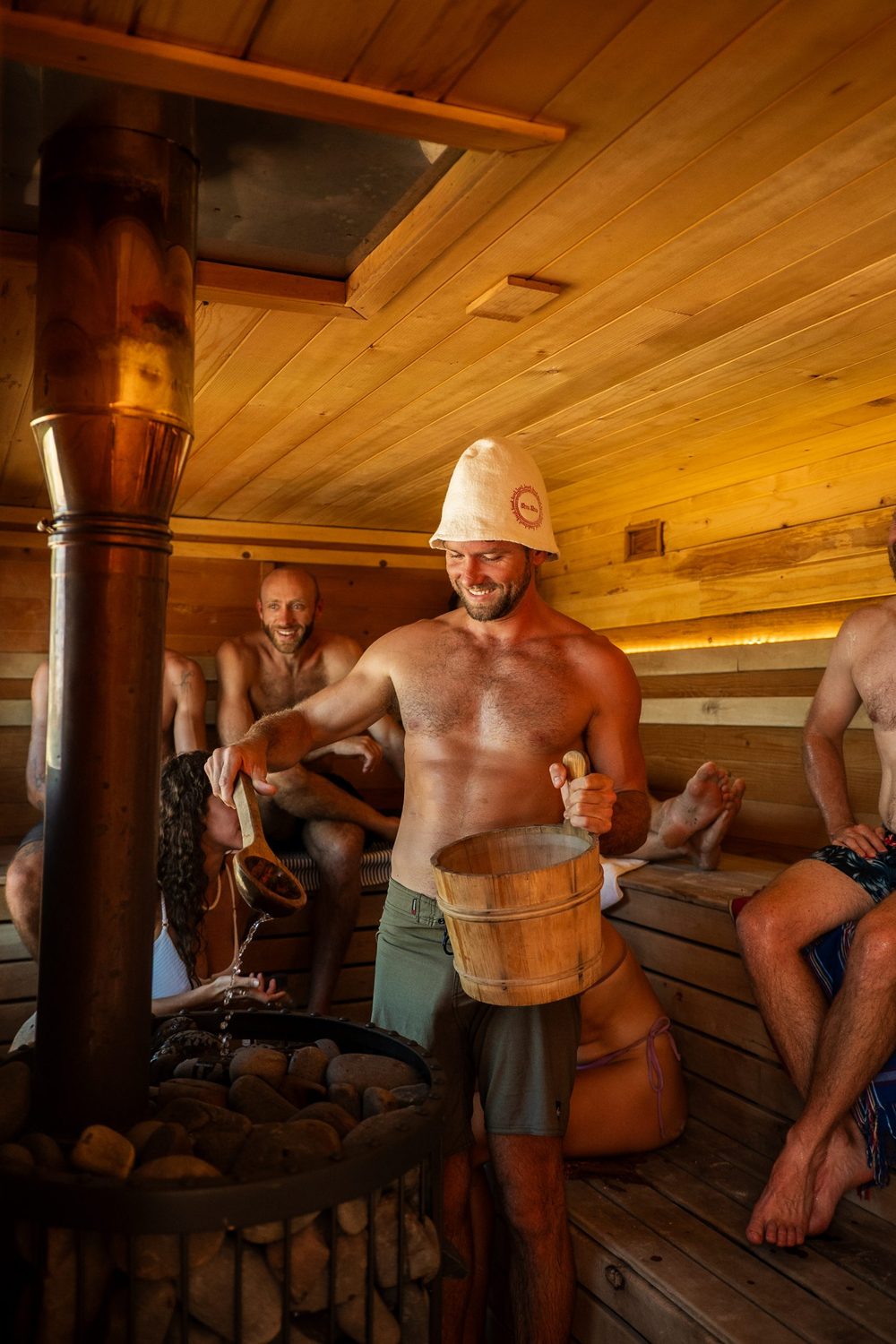 Pouring water on the sauna stones